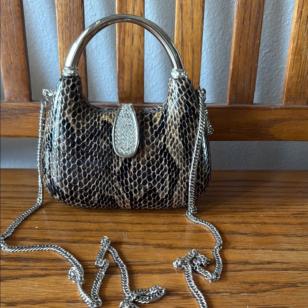 Brown and Silver Mini Bag with Structured Shape and Versatile Strap